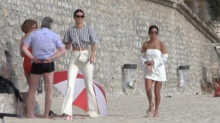 Exclusive  Kendall Jenner and Kourtney Kardashian take a walk on the beach in Cannes [upl. by Halladba]